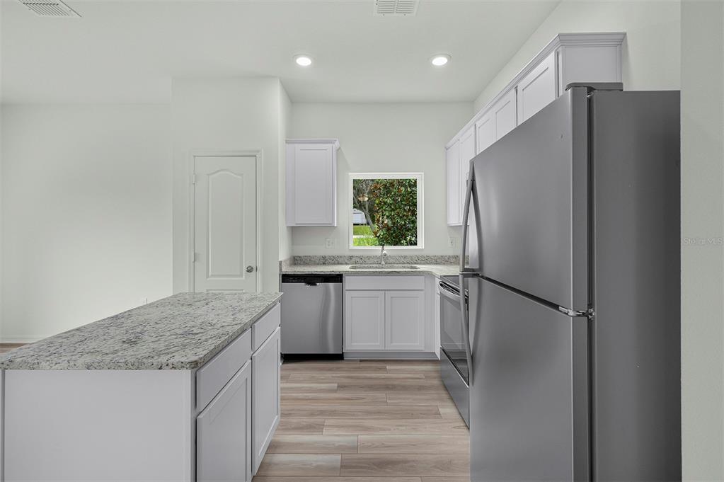 13296 TULA LOOP, ASTATULA, FL — photo 5 of 19