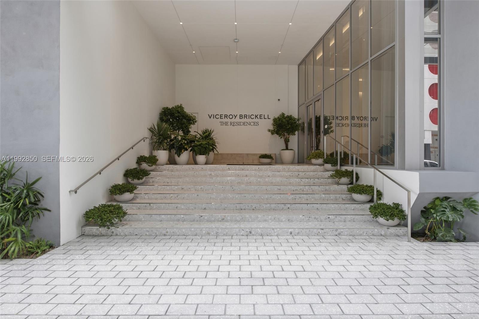 A wide stone staircase leads to the entrance of a building named Viceroy Brickell — 77 SE 5th Street # 2914, Miami FL 33131, MIAMI, FL