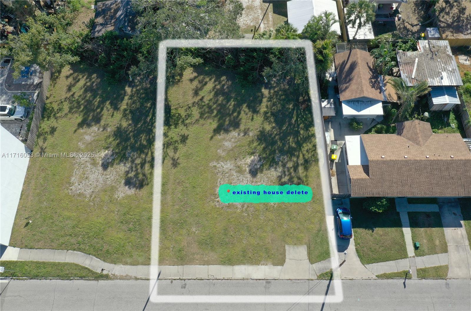 An aerial view shows a vacant rectangular residential lot outlined in white with a sidewalk — 1744 10th st, Sarasota FL 34236, SARASOTA, FL