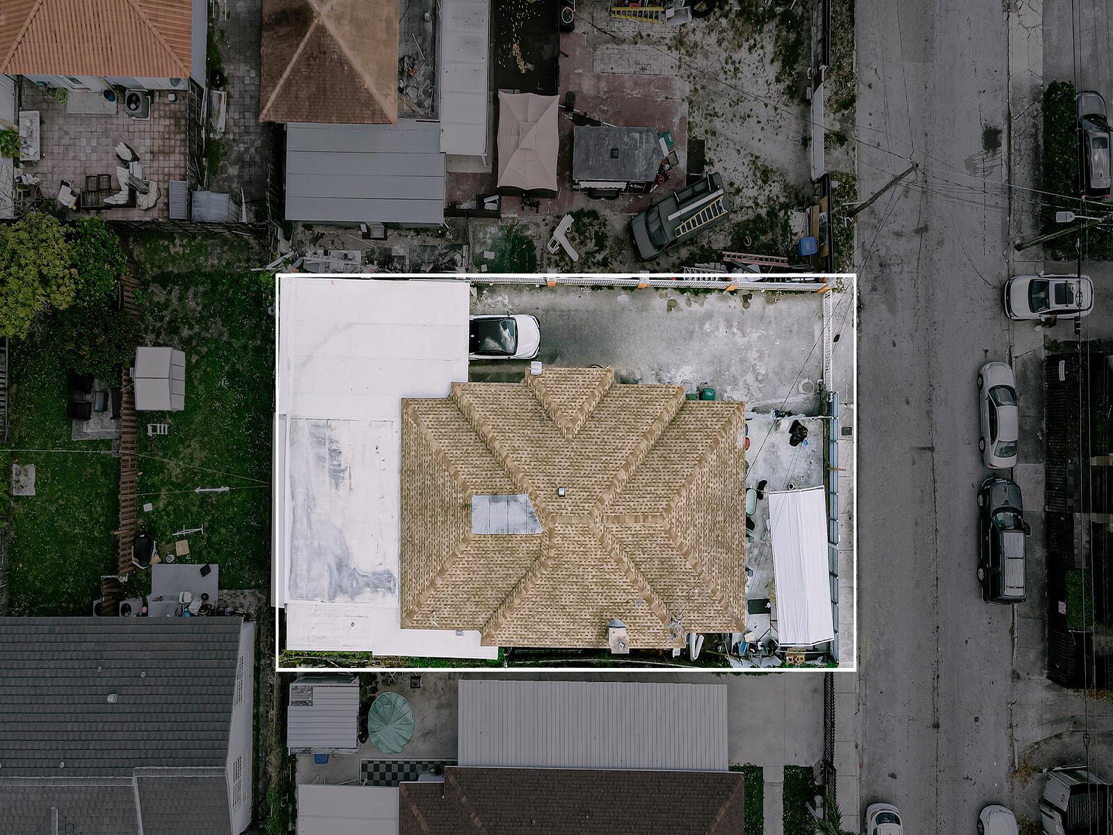 An aerial view shows a house with a shingled roof and a white flat roof section — 1757 NW 1st Street, Miami FL 33125, MIAMI, FL