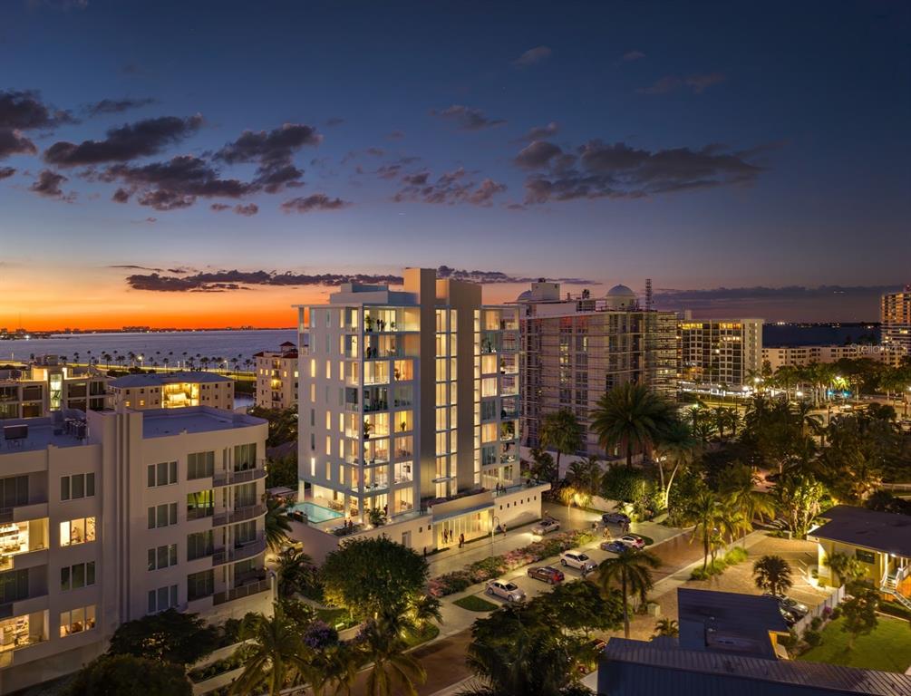 This is a rendering of a modern residential building at sunset near the water — 621 GOLDEN GATE POINT, SARASOTA, FL