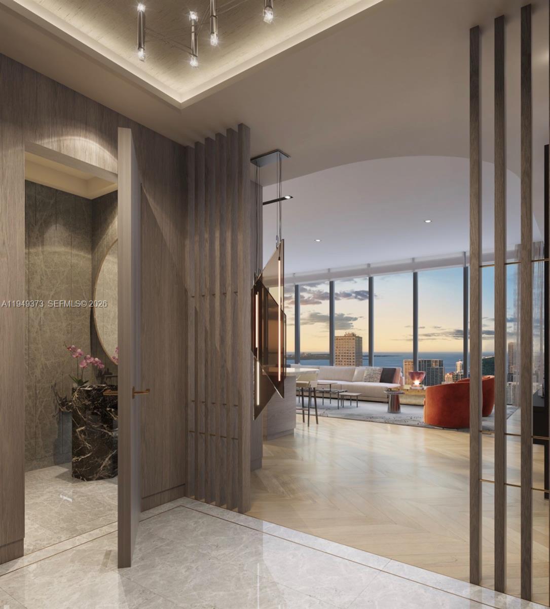 This rendering shows a modern entryway leading to a living area with floor-to-ceiling windows — 300 N Biscayne Blvd. # 4608, Miami FL 33132, MIAMI, FL