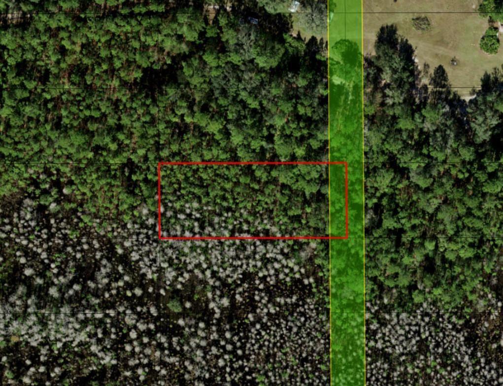 An aerial map view shows a rectangular property outlined in red next to a green easement — 0 Old Grade Road, FL 33868, FL