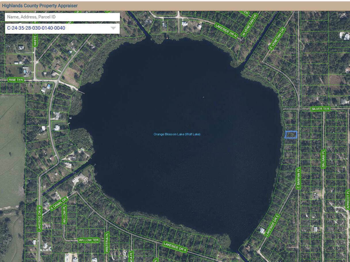 This is a map showing a lake surrounded by residential streets and property parcels — 6507 E Banyan Place, Sebring FL 33875, SEBRING, FL