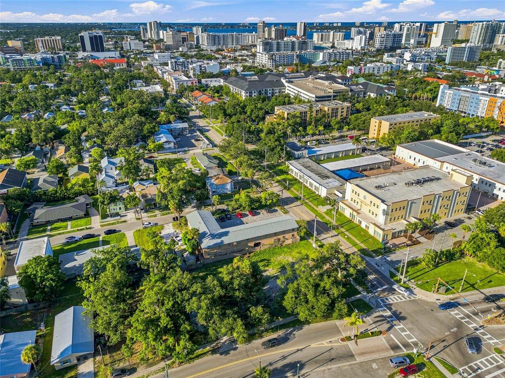 An aerial view shows a rectangular lot with a multi-unit building and trees — 918 ORANGE AVENUE, SARASOTA, FL
