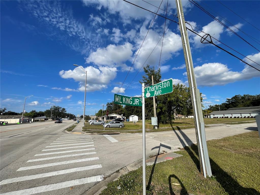 A street sign at the intersection of ML King Jr St and Charleston Ave — 7 4TH STREET SE, FORT MEADE, FL