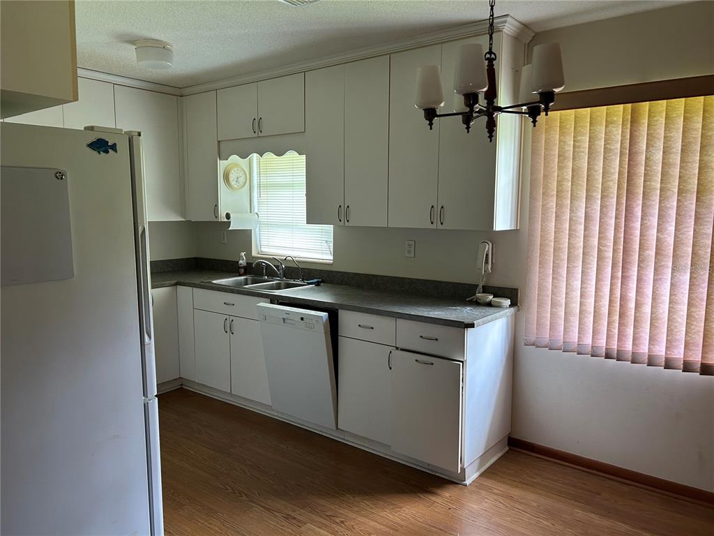 24121 ARMADILLO ROAD, ASTOR, FL — photo 5 of 12