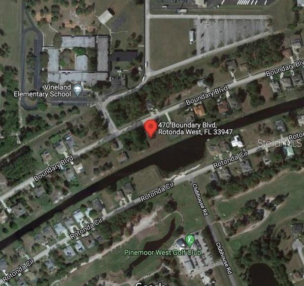 This is an aerial map view showing a residential property location near a golf course — 470 & 472 BOUNDARY BOULEVARD, ROTONDA WEST, FL