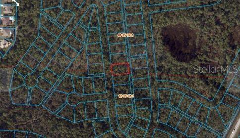 This is an aerial map showing a highlighted rectangular plot of land among wooded lots — PERDIDO BAY COUNTRY 6, PENSACOLA, FL
