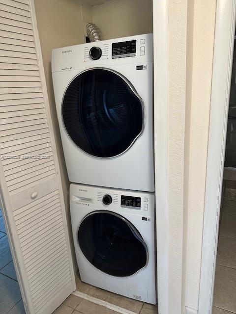 A stacked Samsung washer and dryer unit is installed inside a closet — 10900 SW 104th St # 118, Miami FL 33176, MIAMI, FL