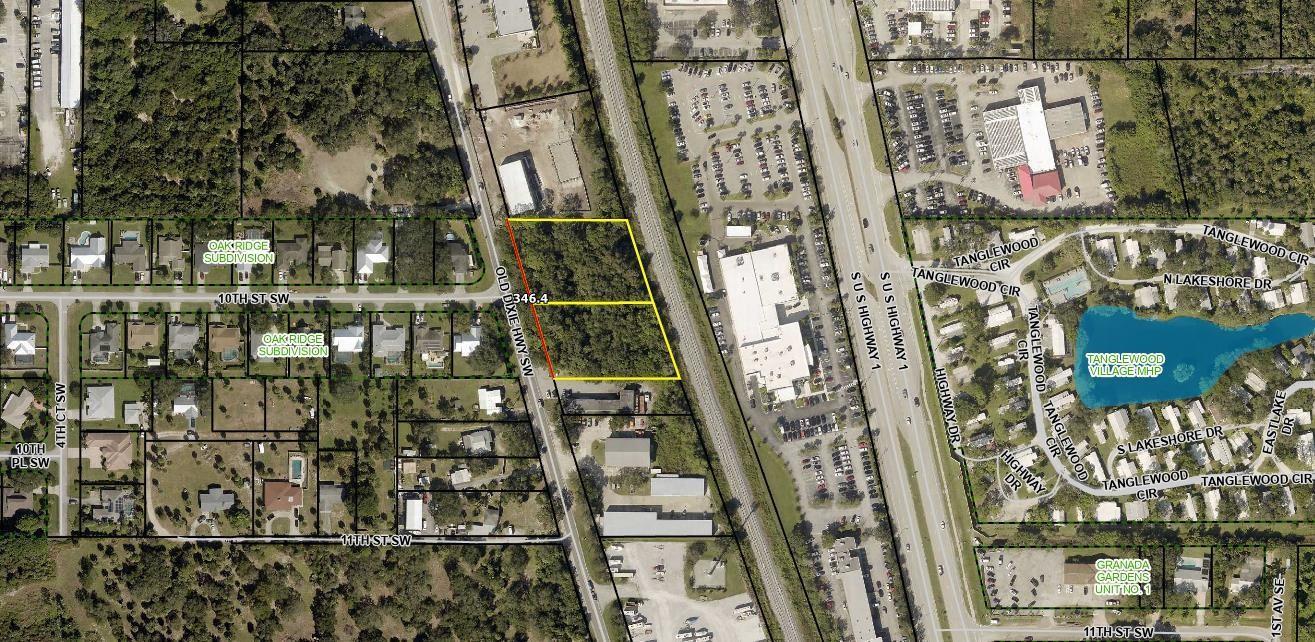 An aerial map view shows a vacant, rectangular lot outlined in yellow near a highway — 1010 Old Dixie Highway, Vero Beach FL 32962, VERO BEACH, FL