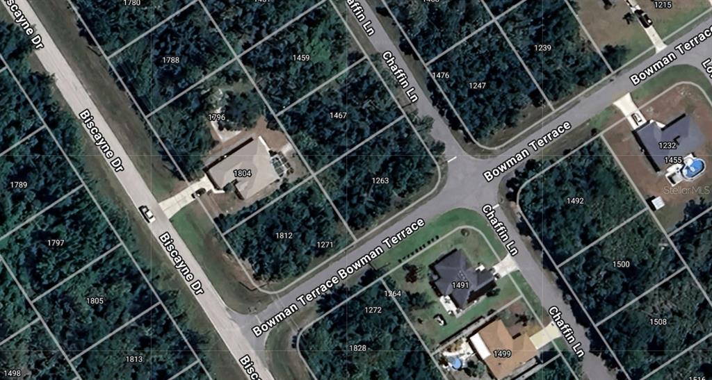 This is an aerial map showing residential lots, streets, and houses in a neighborhood — 1263 BOWMAN TERRACE, PORT CHARLOTTE, FL