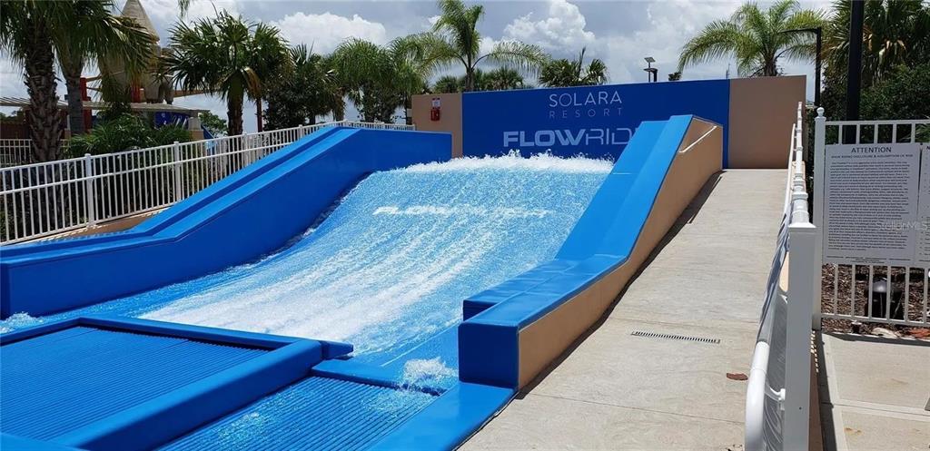 A FlowRider surfing simulator is located outdoors at the Solara Resort pool area — 2182 COOPER BELL PLACE, KISSIMMEE, FL