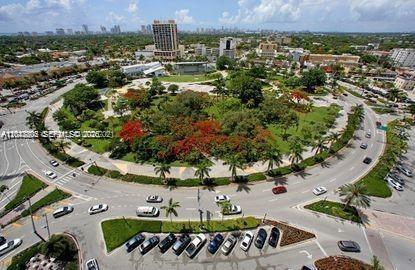 An aerial view shows a large circular park surrounded by a multi-lane road and buildings — 2126 Arthur St # 1, Hollywood FL 33020, HOLLYWOOD, FL