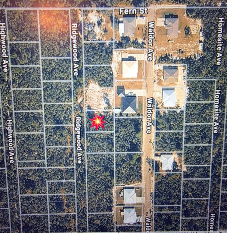 This aerial map shows a vacant residential lot marked with a star near Waldor Avenue — RIDGEWOOD AVENUE, ORANGE CITY, FL