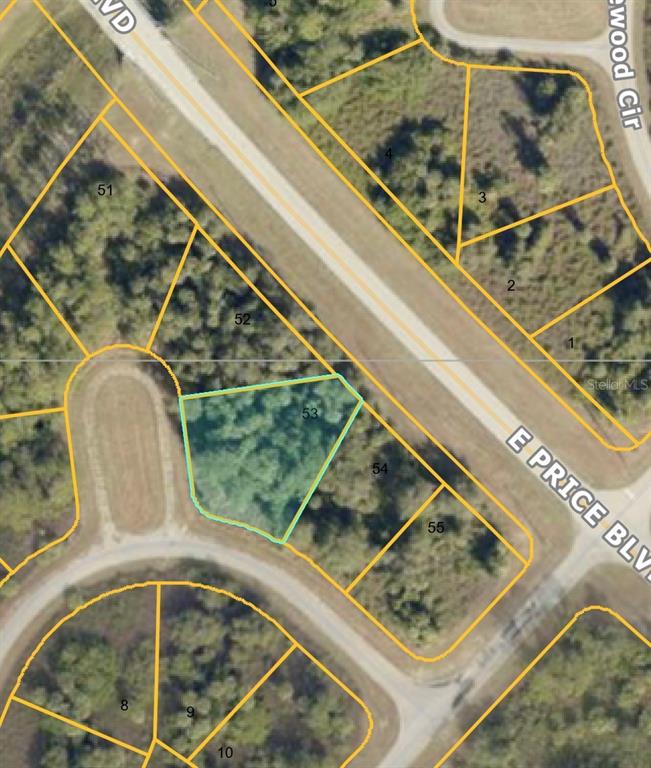 This is an aerial map showing a highlighted vacant lot located along a curved road — GROVER CIRCLE, NORTH PORT, FL