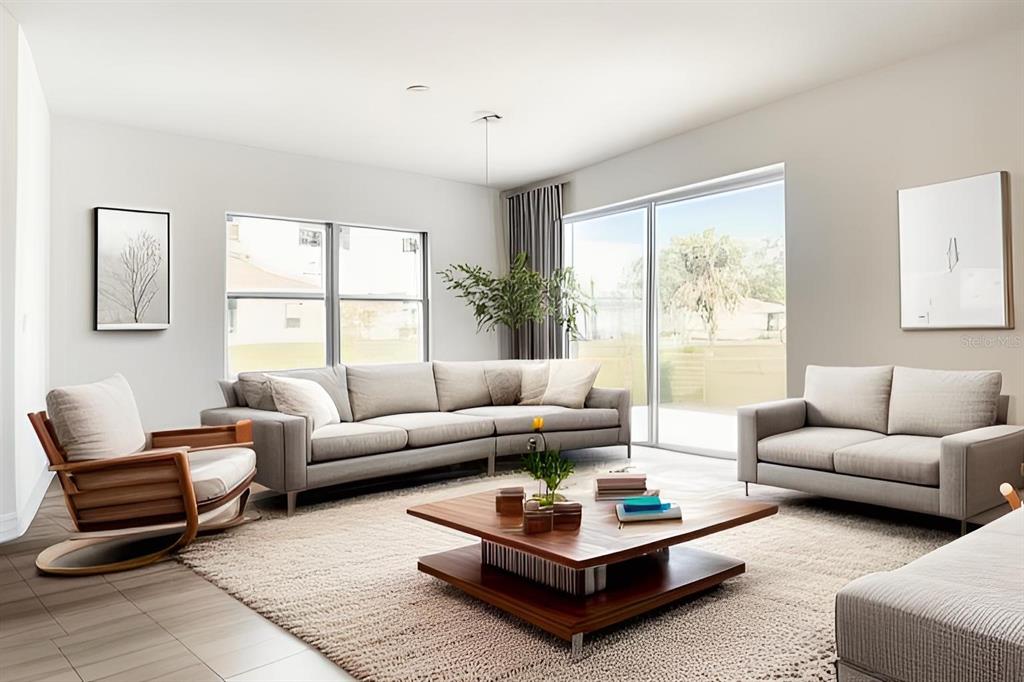This is a digital rendering of a modern living room with gray furniture and a coffee table — 2165 MUSIC LANE, NORTH PORT, FL