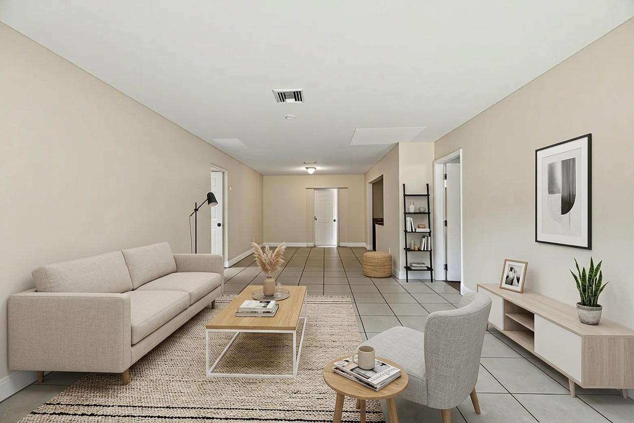 A living room features light-colored tile floors, a beige sofa, and a neutral color palette — 5131 SW 6th Street, Margate FL 33068, MARGATE, FL