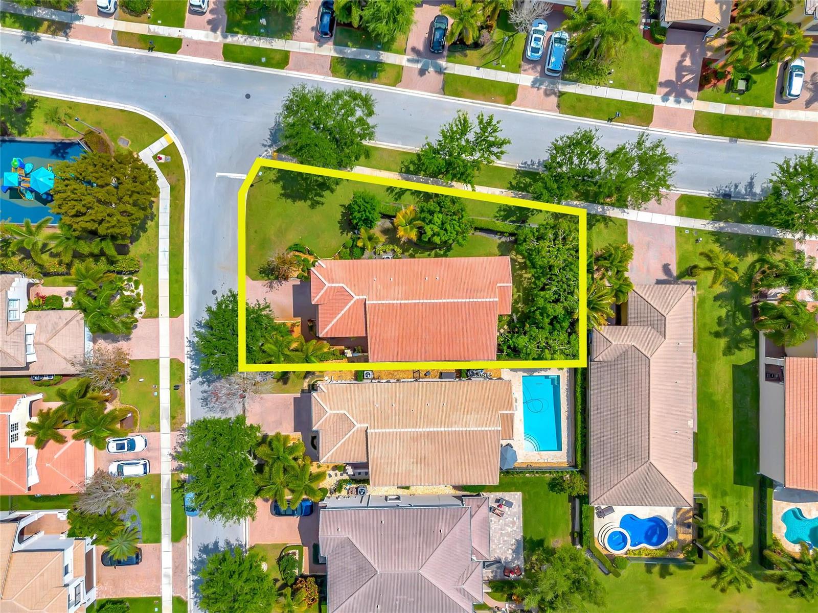 An aerial view shows a single-story house with a red tile roof on a corner lot — 11729 Rock Lake Terrace, Boynton Beach FL 33473, BOYNTON BEACH, FL