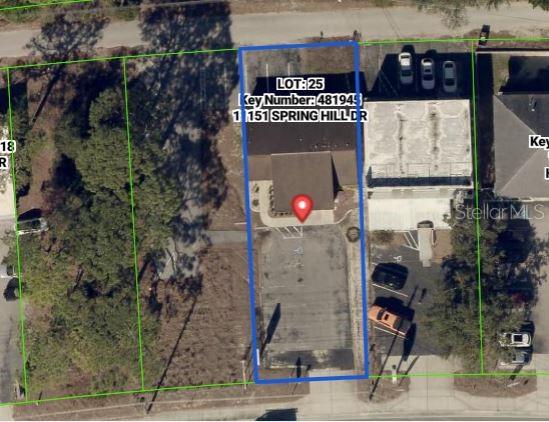 An aerial map view shows a commercial property lot with a building and parking area — 11151 SPRING HILL DRIVE, SPRING HILL, FL