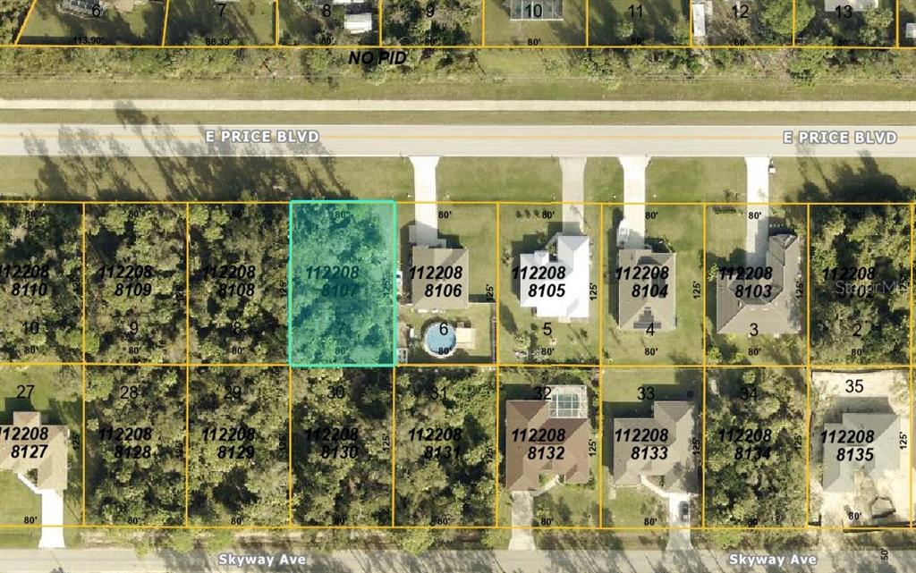 This is a map showing a vacant residential lot highlighted in blue among neighboring properties — E PRICE BOULEVARD LOT 7, NORTH PORT, FL