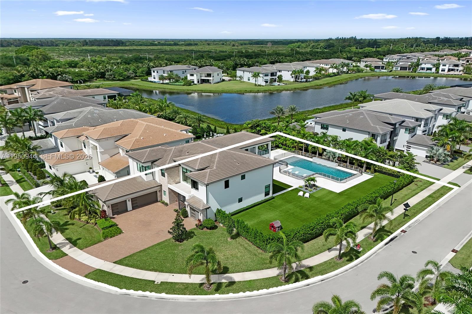 An aerial view shows a large suburban house with a pool and fenced backyard — 17385 Ponte Chiasso Dr, Boca Raton FL 33496, BOCA RATON, FL