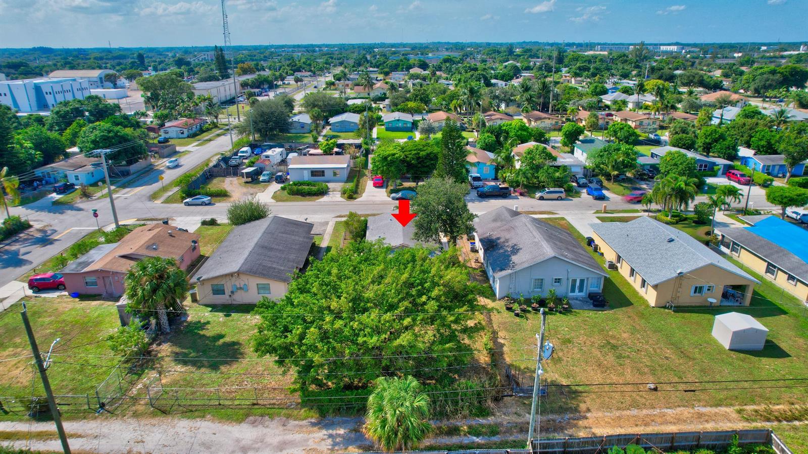 An aerial view shows a residential neighborhood with a red arrow pointing to a house — 237 SW 11th Avenue, Delray Beach FL 33444, DELRAY BEACH, FL
