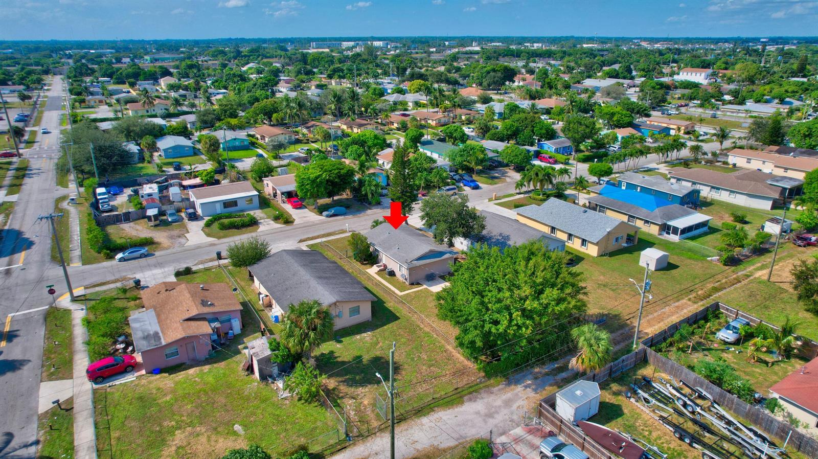 An aerial view shows a single-story house with a red arrow pointing to its roof — 237 SW 11th Avenue, Delray Beach FL 33444, DELRAY BEACH, FL