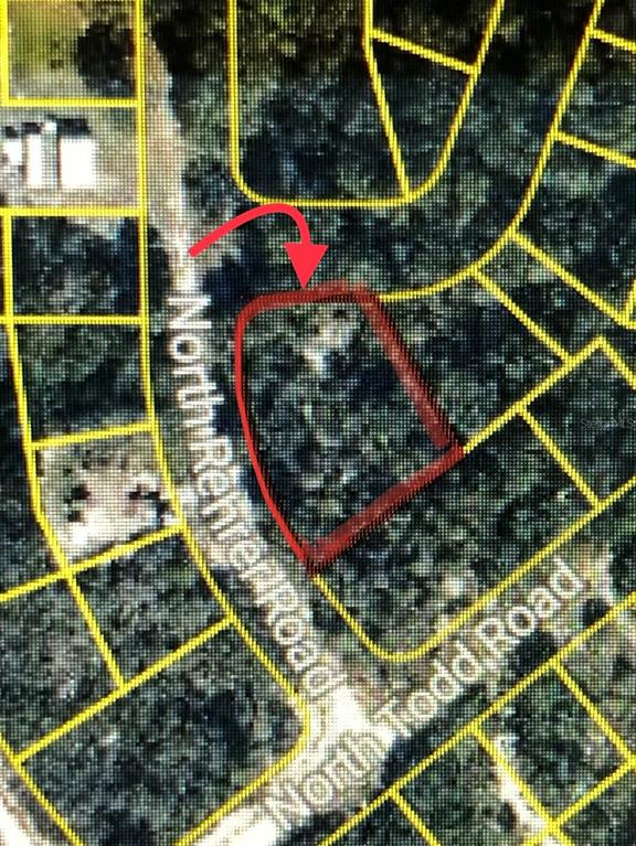 This is a map showing a highlighted parcel of land located at a road intersection — 2610 N REHRER ROAD, AVON PARK, FL