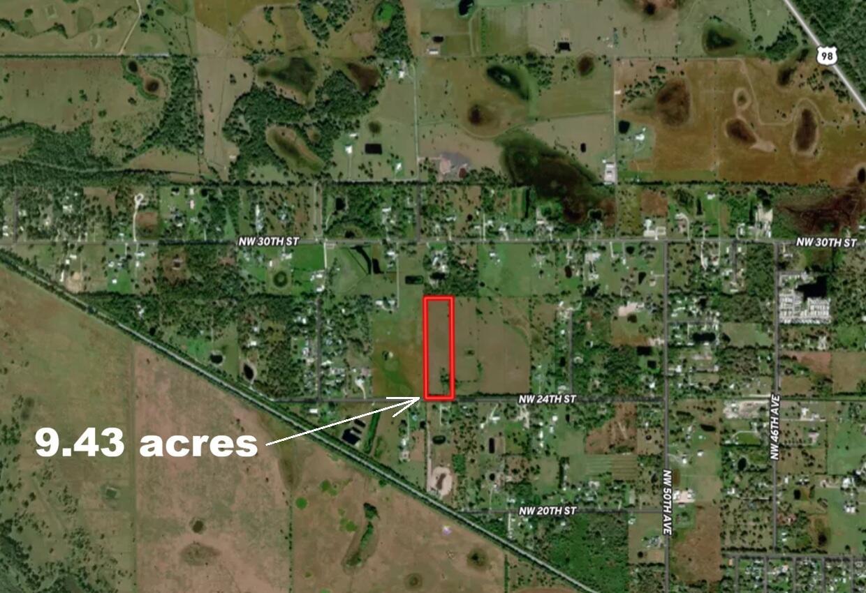 An aerial map shows a rectangular 9.43-acre parcel of land outlined in red — 5573 NW 24th Street, Okeechobee FL 34972, OKEECHOBEE, FL