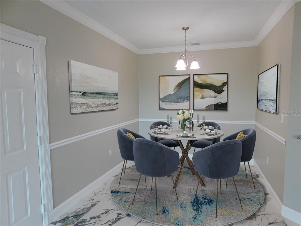 This dining room features a round table, six blue chairs, and wall art — 2725 VIA CIPRIANI UNIT 735B, CLEARWATER, FL