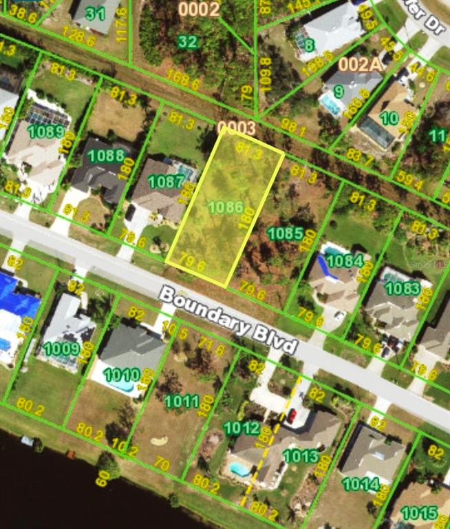 This is a satellite map view showing a vacant residential lot highlighted in yellow — 643 BOUNDARY BOULEVARD, ROTONDA WEST, FL