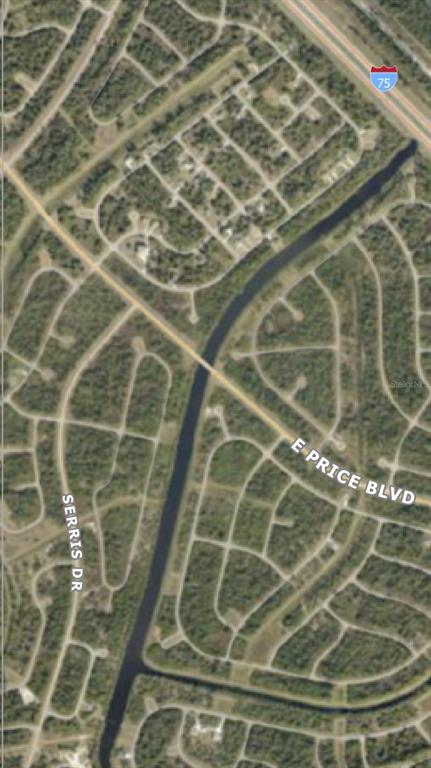This is an aerial map view showing residential streets, a canal, and a highway — BEN COURT, NORTH PORT, FL