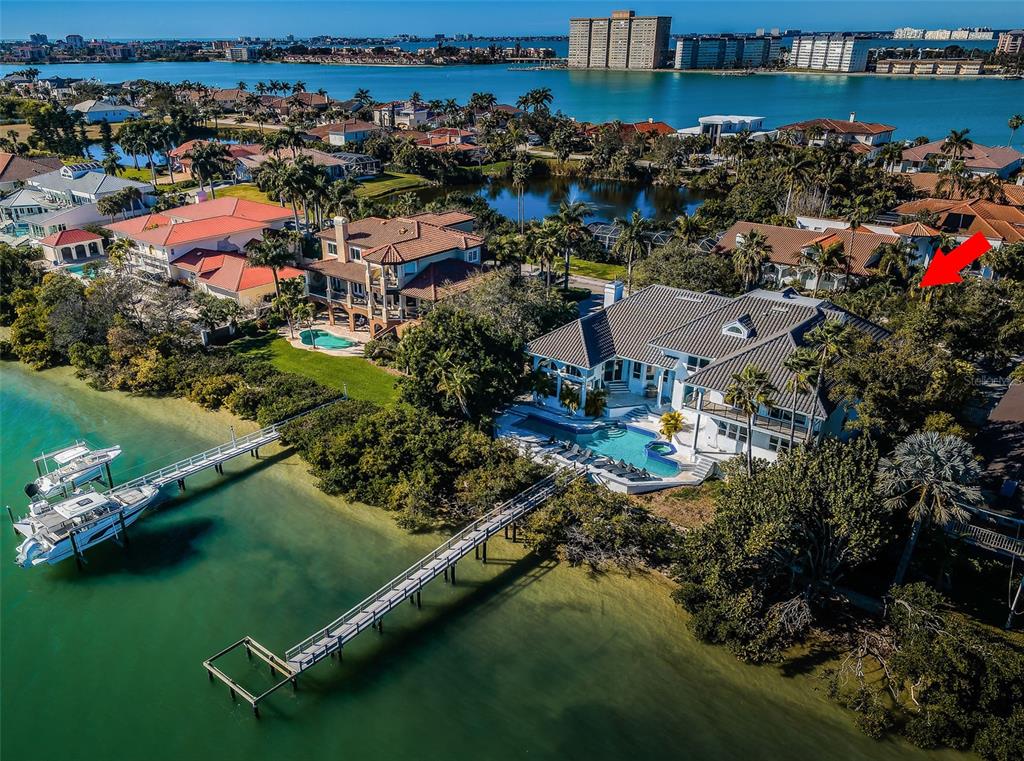 An aerial view of a waterfront home with a private dock and swimming pool — 5212 62ND AVENUE S, ST PETERSBURG, FL