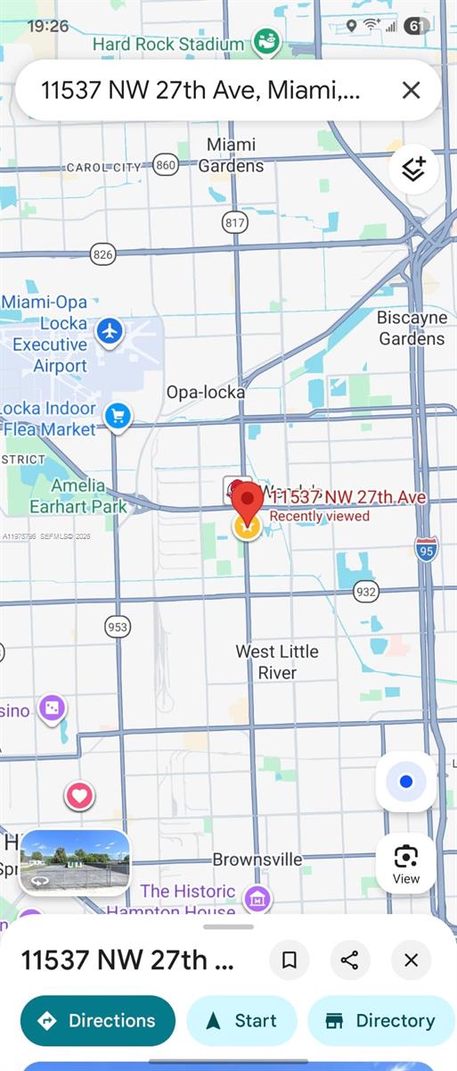 A small, flat-roofed building sits behind a chain-link fence on a paved lot — 11537 NW 27th Ave, Miami FL 33167, MIAMI, FL