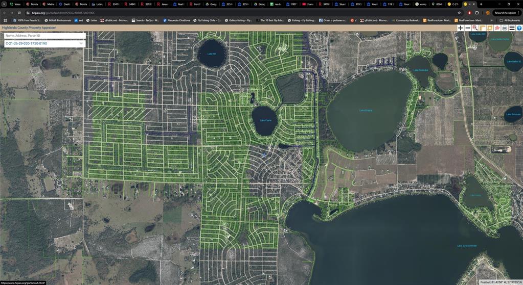 This is a satellite map showing a residential neighborhood layout with several lakes in Florida — 3410 GOSSAMER AVENUE, LAKE PLACID, FL