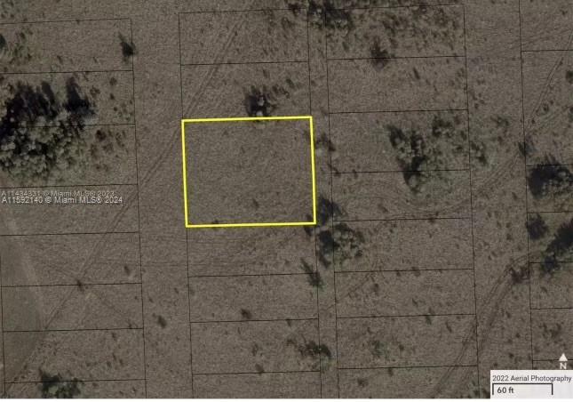 An aerial view of a vacant, rectangular plot of land outlined in yellow on a map — 36xx SW 159th Court, Miami FL 33185, MIAMI, FL