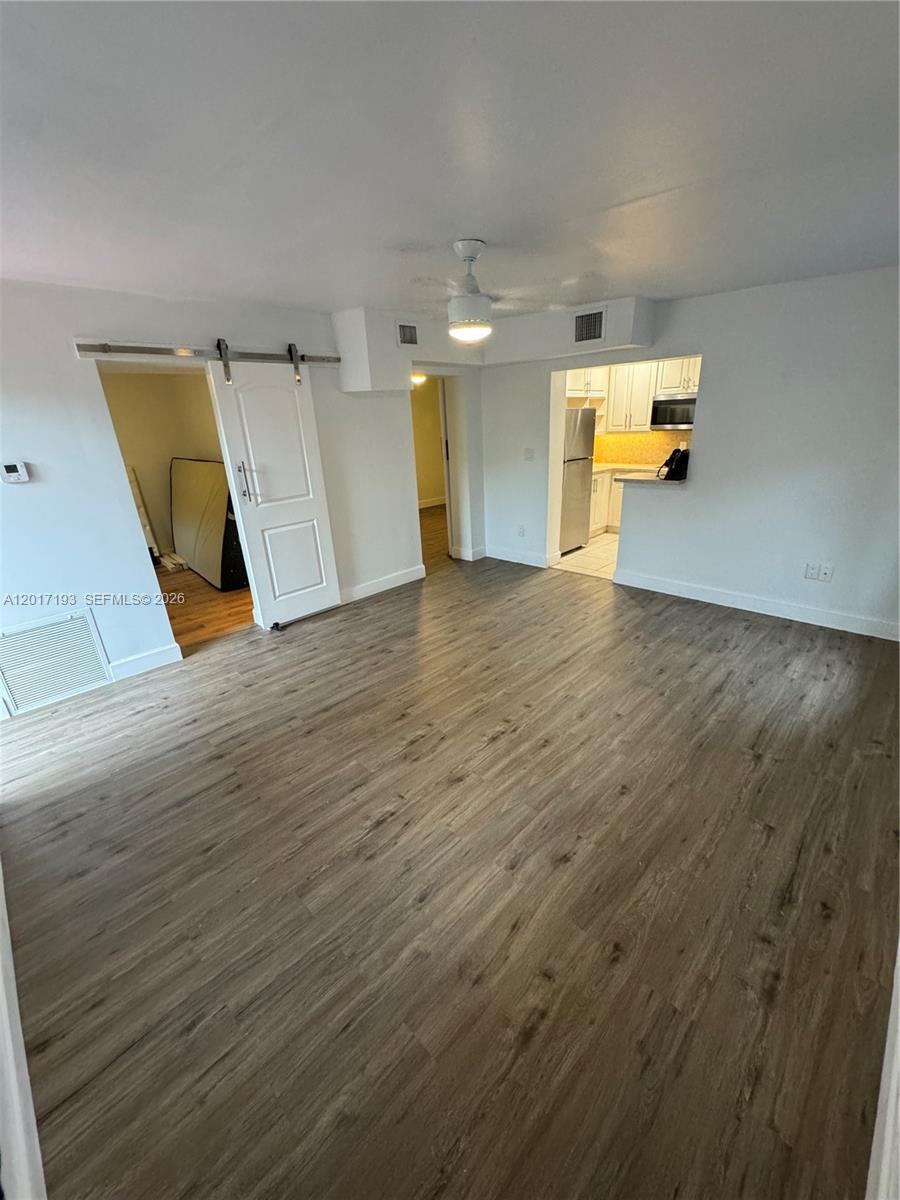 A red patio leads to a house entrance with a number 21 sign — 235 SW 64th Ave # 2B, Miami FL 33144, MIAMI, FL