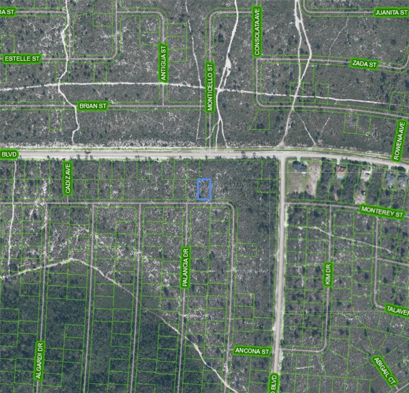 This is an aerial map showing a highlighted rectangular plot of land in a residential area — 6518 GEOFF DRIVE, SEBRING, FL