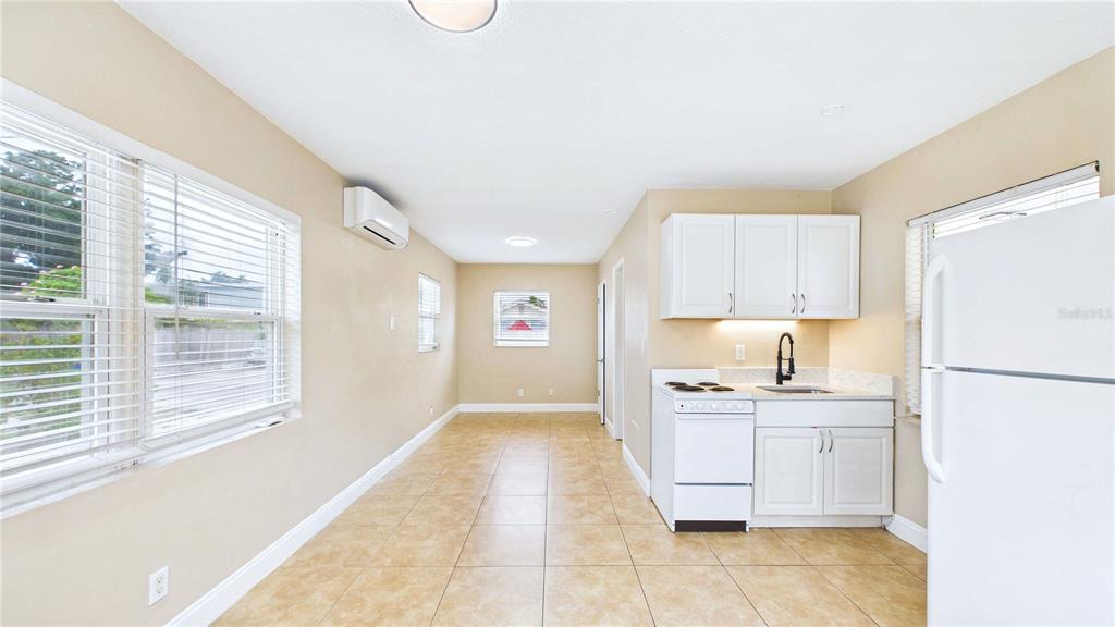 This is a floor plan for a one-bedroom apartment with a kitchen and bathroom — 3815 1ST AVE N UNIT C, ST PETERSBURG, FL