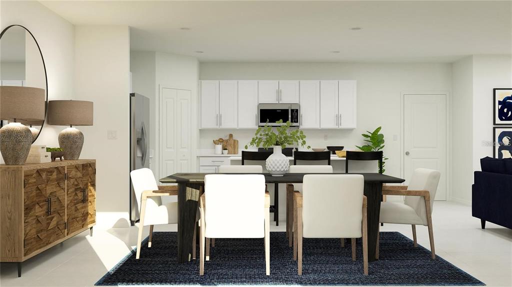This is a digital rendering of a dining area and kitchen with white cabinetry — 11851 NOBLE CHASE PATH, DADE CITY, FL