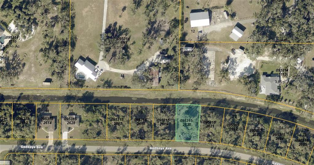 This is an aerial map showing residential property lots and a canal along Gadboys Ave — 0 GADBOYS AVENUE, NORTH PORT, FL