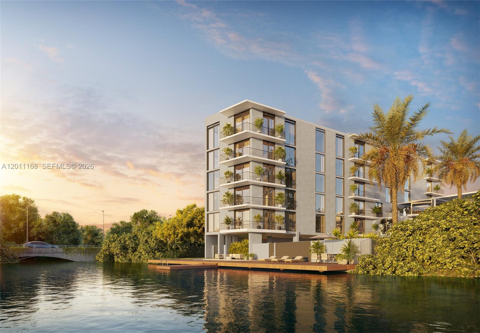 This architectural rendering shows a modern multi-story apartment building situated beside a calm canal — 18550 NE 23rd Ct # 202, Miami FL 33180, MIAMI, FL