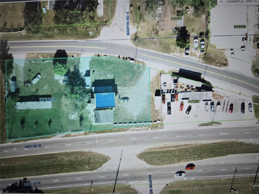 An aerial map view showing two adjacent commercial or residential properties along a highway — 1725 OLD BARTOW ROAD, LAKE WALES, FL