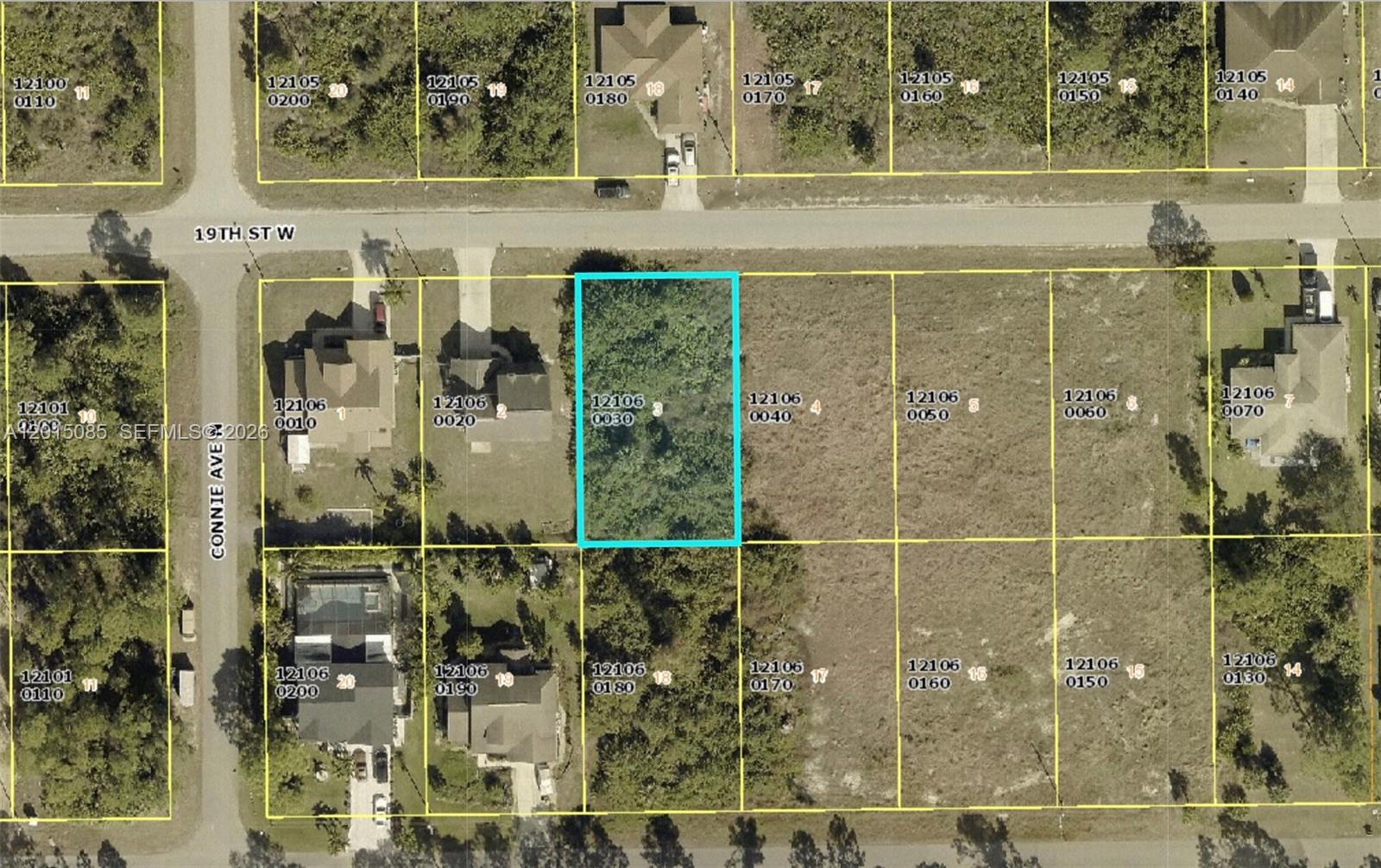 This is an aerial map showing a highlighted vacant lot among other residential properties — 2515 19Th St W, Lehigh Acres FL 33971, LEHIGH ACRES, FL
