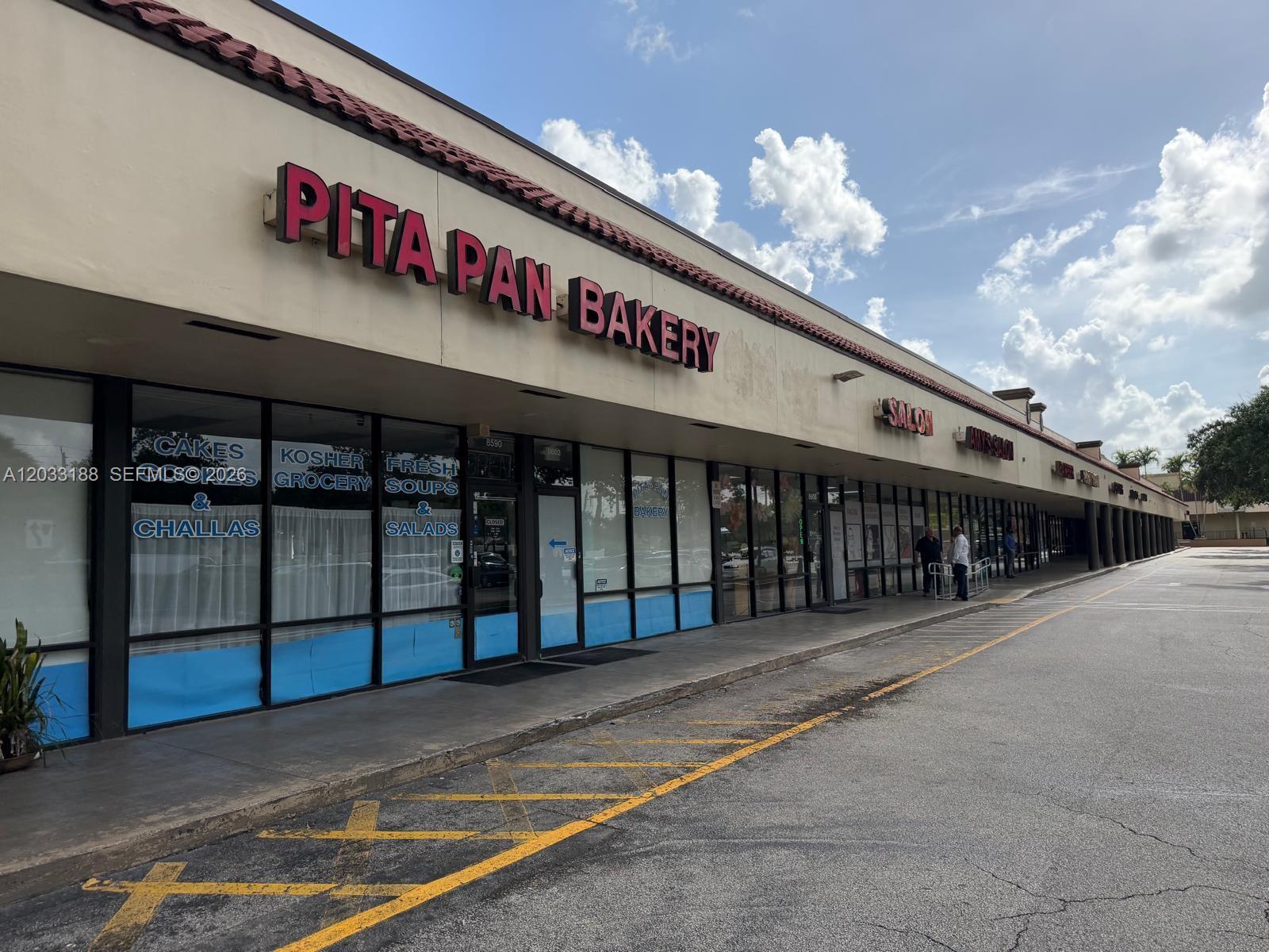 A strip mall exterior features a Pita Pan Bakery storefront with large glass windows — 8618 NW 44th st, Sunrise FL 33351, SUNRISE, FL