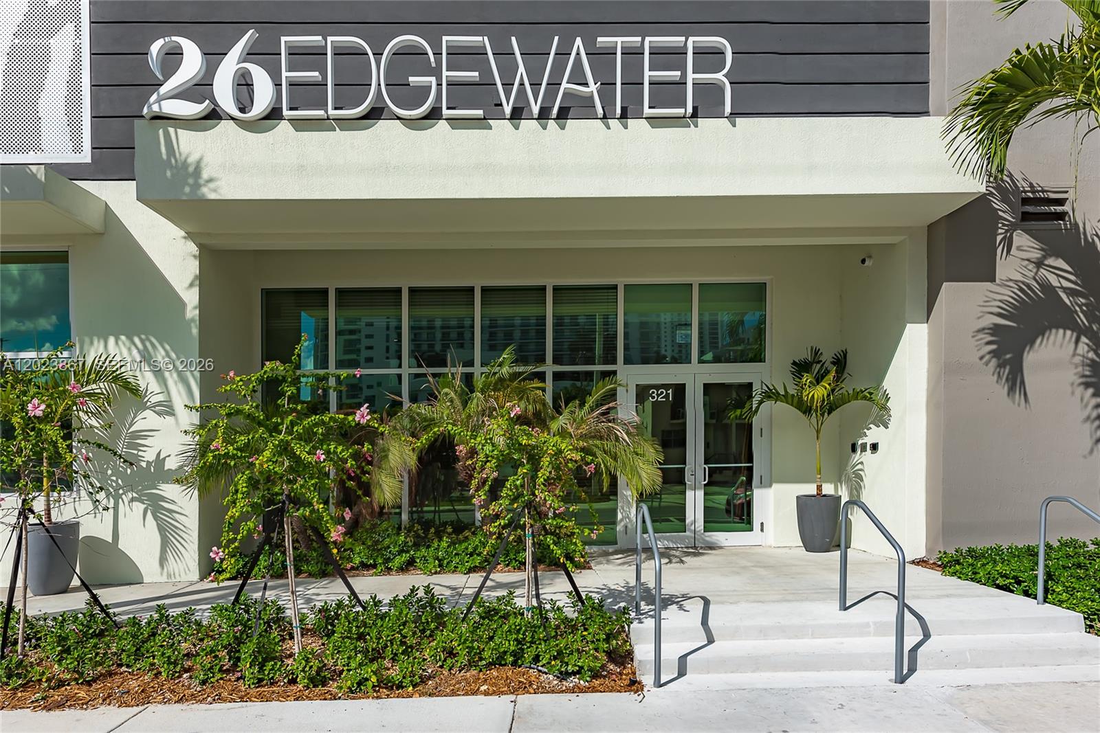 The exterior entrance of a building features a sign reading 26EDGEWATER above glass doors — 321 NE 26th St # 604, Miami FL 33137, MIAMI, FL
