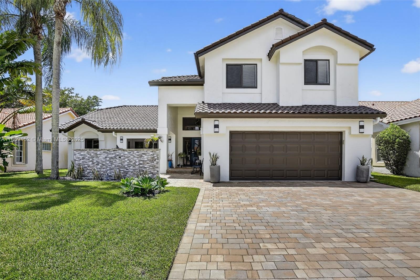 1154 Laguna Springs Dr, Weston FL 33326