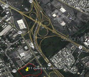 An aerial map view shows a highlighted land parcel located near a major highway interchange — 848 PR-848 INT PR-887, CAROLINA, PR