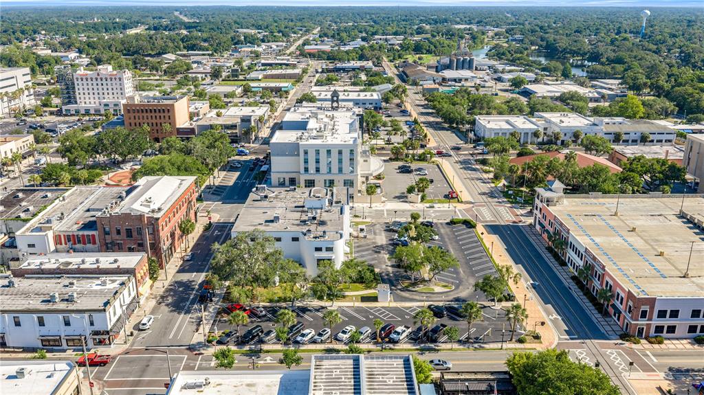 An aerial view shows a city block with commercial buildings, parking lots, and surrounding streets — 35 SE 1ST AVENUE 2nd Floor, OCALA, FL